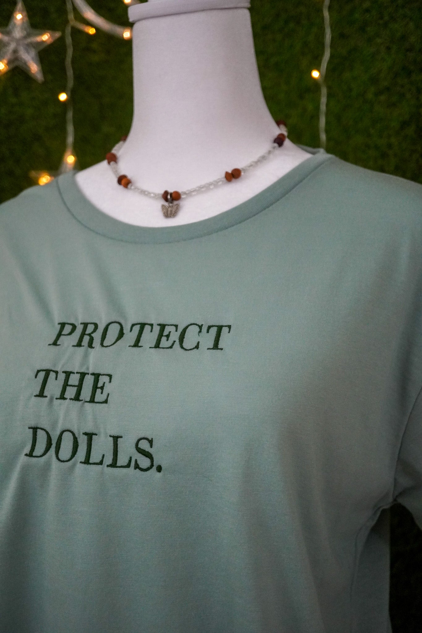 Protect the Dolls Green Cropped Tee L